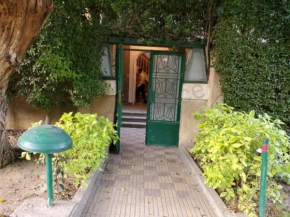 Elegant villa with private entrance, garden and swimming pool